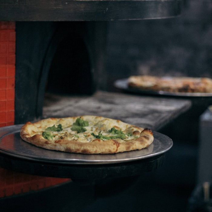 Boosting Efficiency and Performance in Your Pizzeria with Canmac Pizza Oven Maintenance