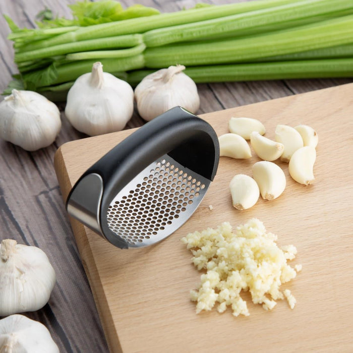 Nisbets Essentials Curved Garlic Press Nisbets Essentials