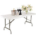Bolero Rectangular Centre Folding Table 6ft White Bolero